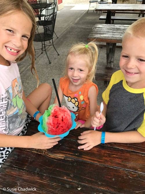 3 kids eating shaved ice - Big Island of Hawaii with kids.