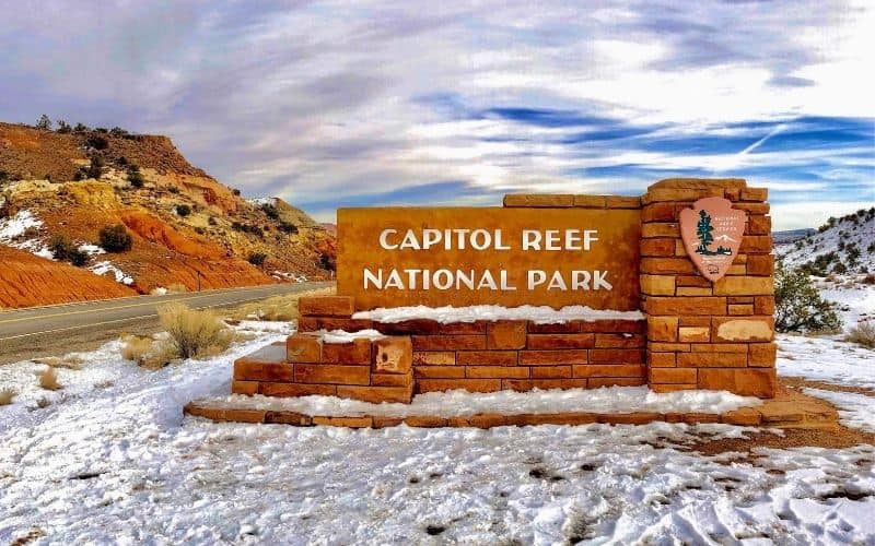 Capitol Reef National Park sign with snow