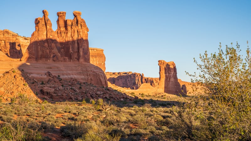 Three Gossips and Sheep at sunrise at Arches