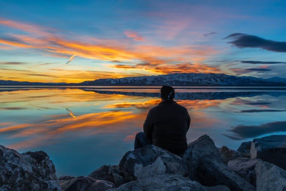 man watching the sunset at Utah Lake State Park