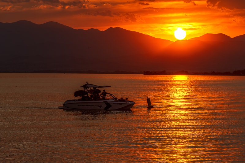 boat on Utah Lake at sunset