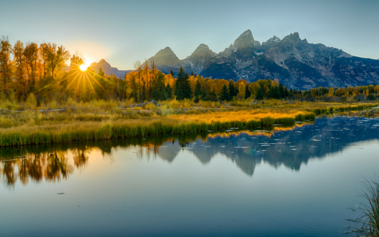 reflection at Schwabacher Landing in the fall