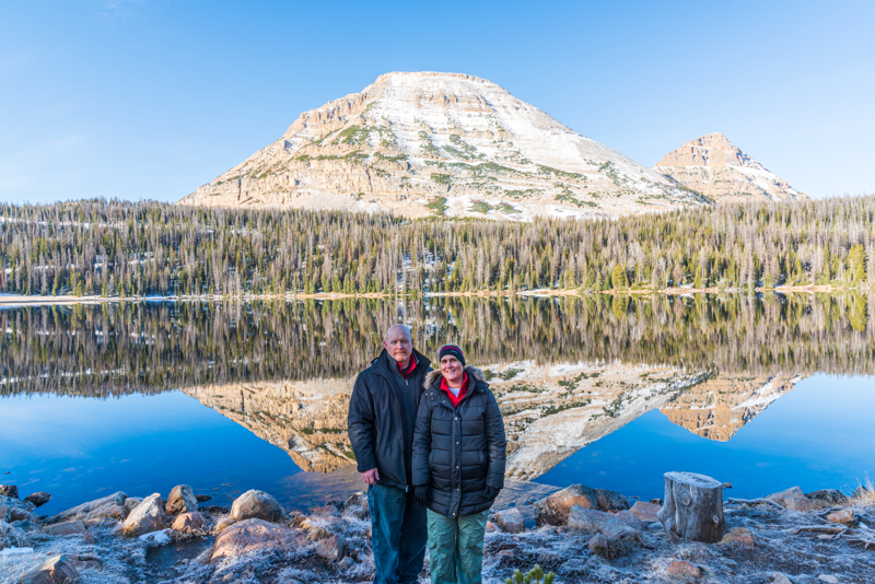 Man and Woman at Mirror Lake in late fall 