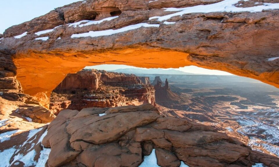 mesa arch in the winter with snow
