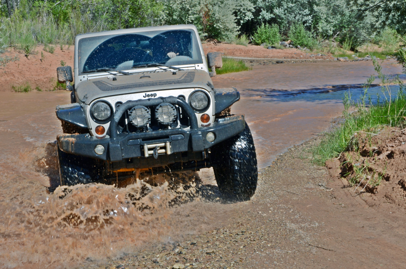 jeep crossing the river to access Cathedral Valley