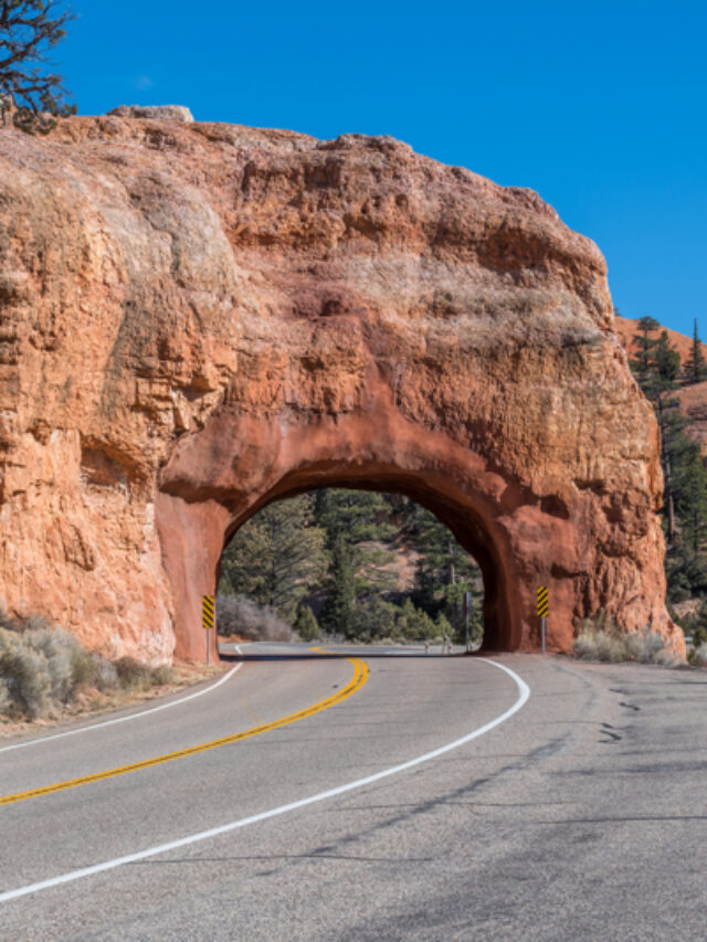 Red Canyon Tunnel by Photo Jeepers