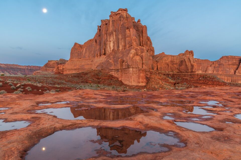 Arches National Park with rain puddles